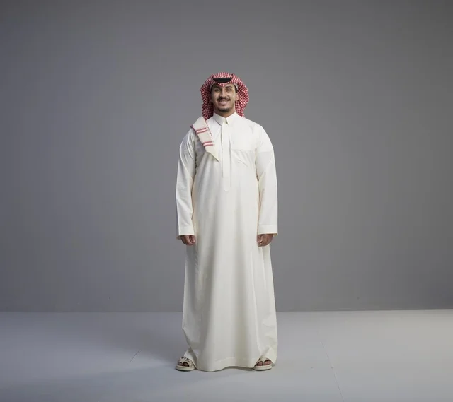 Saudi Man in Traditional Thobe and Shemagh
