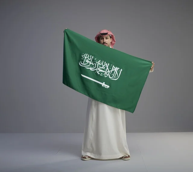 Saudi Man Holding National Saudi Arabia Flag