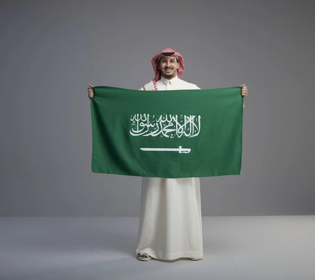 Saudi Man Holding Saudi Arabia National Flag