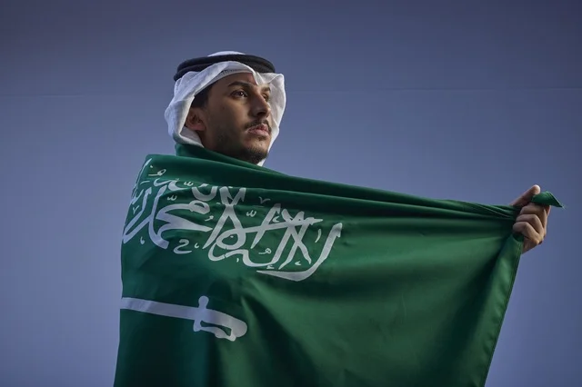 Saudi Arabian Man with National Flag for Celebration