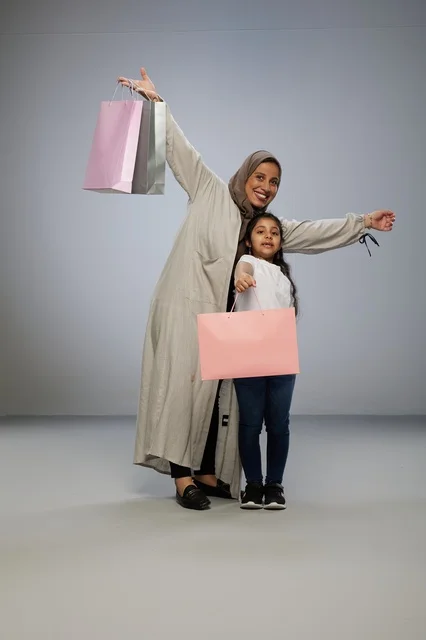 Saudi Mother and Daughter with Shopping Bags