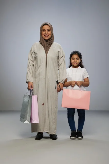 Saudi Mother and Daughter with Shopping Bags