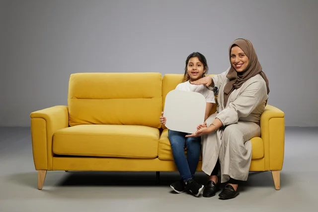 Saudi Mother and Daughter with Blank Mockup Board