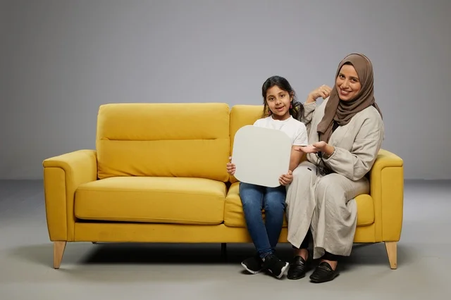Saudi Mother and Daughter with Blank Mockup Board