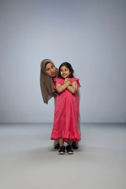 Saudi Mother and Daughter in Studio Portrait