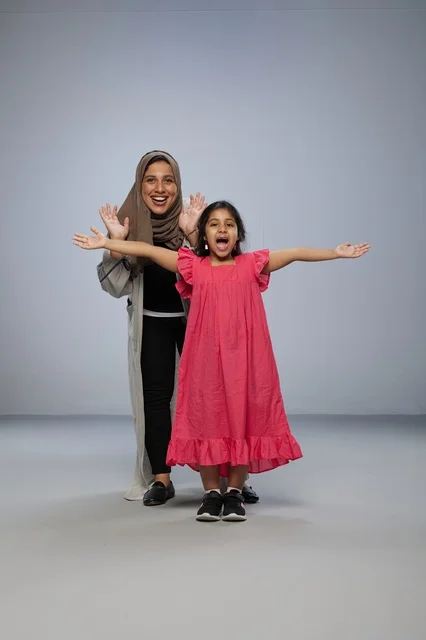 Saudi Mother and Daughter in Studio Portrait