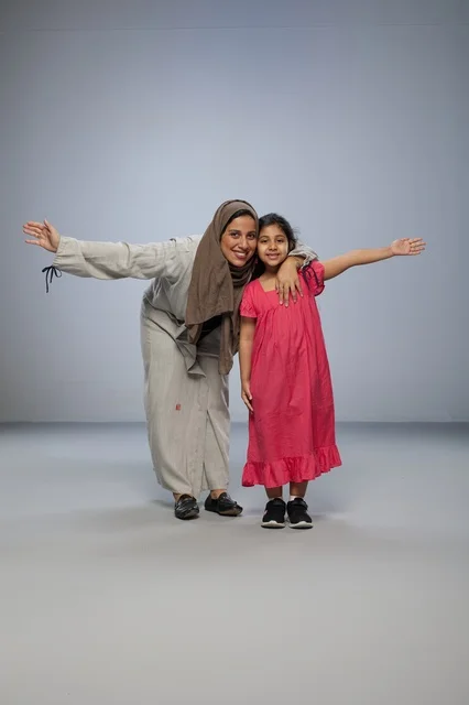 Saudi Mother and Daughter Posing in Studio