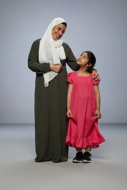 Saudi Mother and Daughter in Studio Portrait
