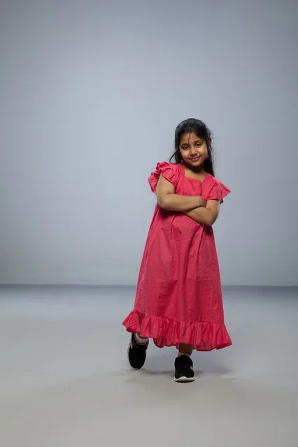 Young Saudi Girl Wearing a Pink Dress
