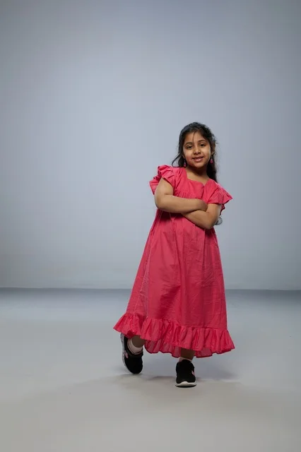 Young Saudi Girl Wearing a Pink Dress