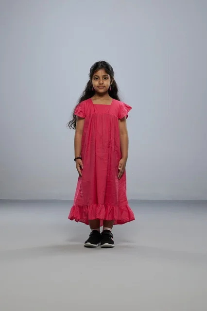 Saudi Girl in Pink Dress Studio Portrait