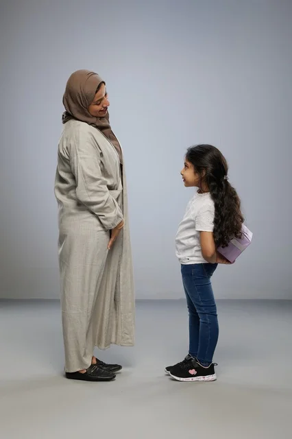 Arab Girl Hiding Gift for Mother in Studio