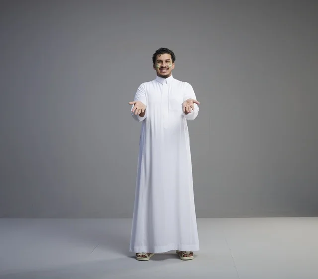 Saudi Man in White Thobe Celebrating National Day