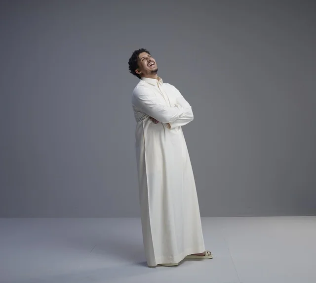 Saudi Man in Traditional White Thobe Studio Background