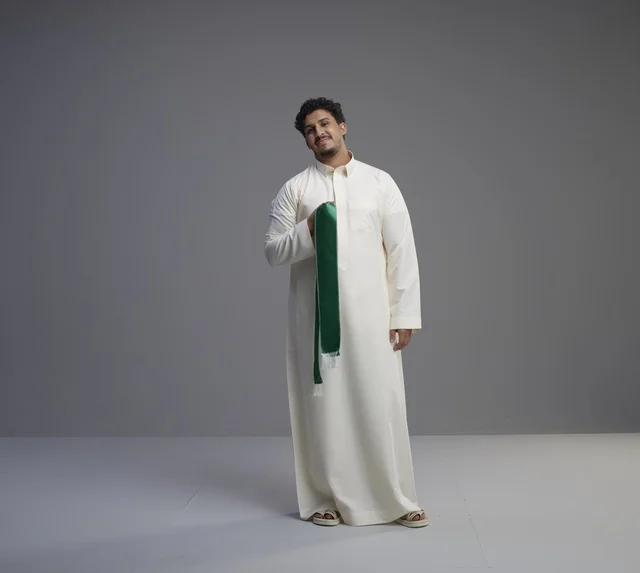 Saudi Man with Green National Scarf in Studio