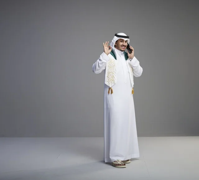 Saudi Graduate Talking on a Smartphone