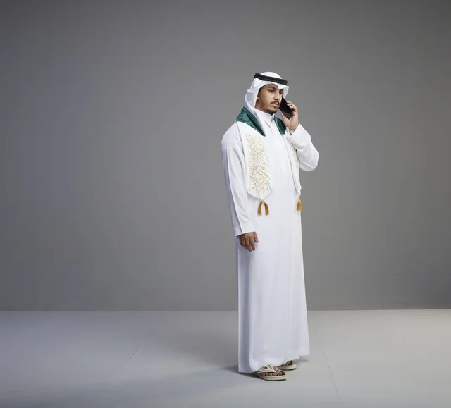 Saudi Graduate Talking on a Smartphone
