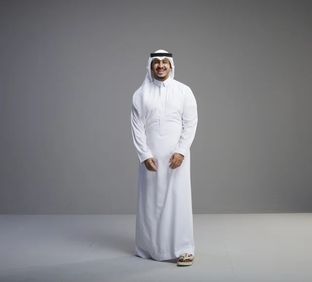 Saudi Man in Traditional White Thob Studio Portrait