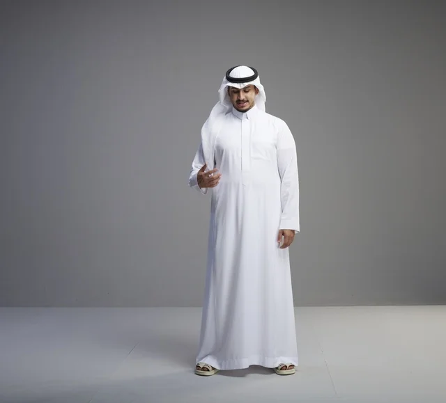 Saudi Man in Traditional White Thobe Studio Portrait