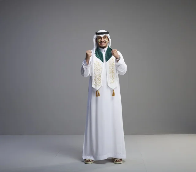 Saudi Graduate in Traditional Dress Celebrating Success