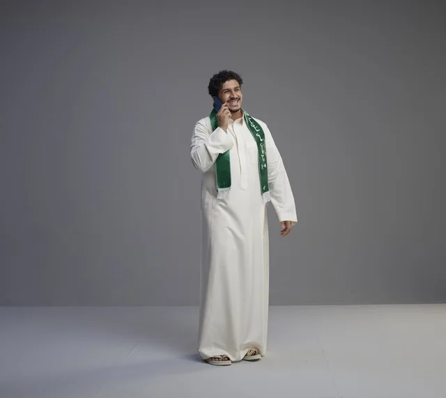 Saudi Man Talking on Smartphone in Studio