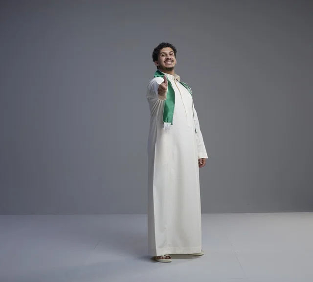 Saudi Man in Thobe with National Scarf in Studio