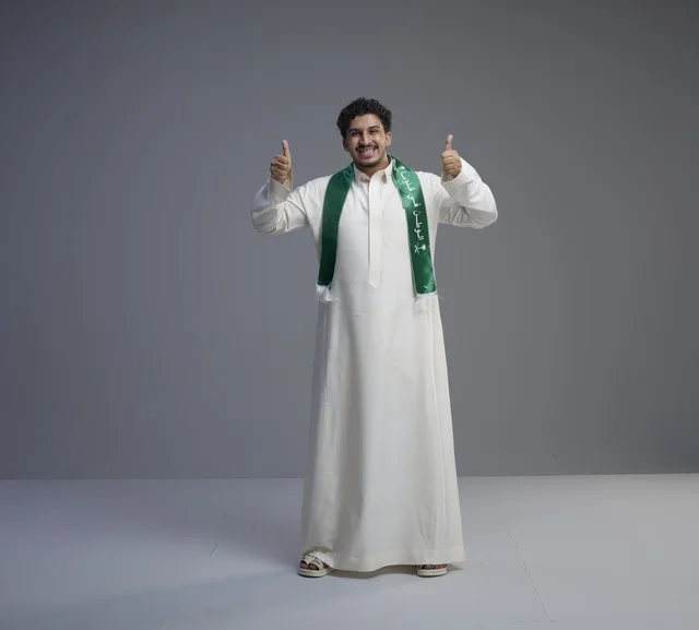 Saudi Man in National Scarf Giving Thumbs Up