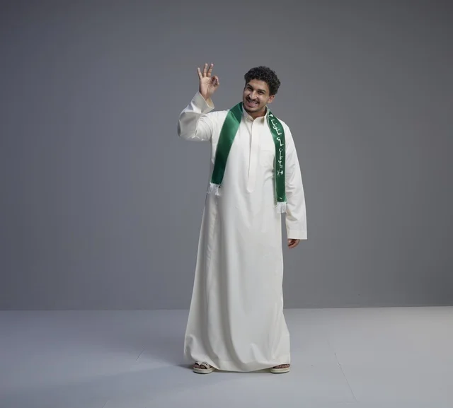 Saudi Man in National Scarf Making OK Gesture