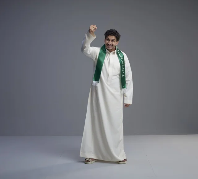 Saudi Man in National Scarf Celebrating in Studio