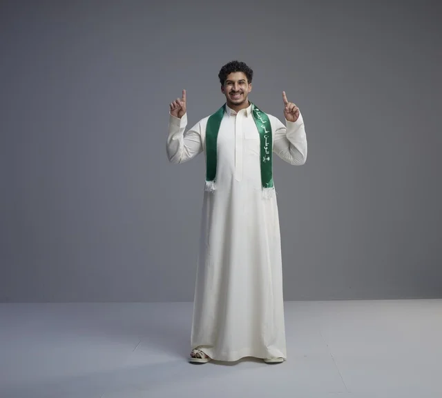 Saudi Man in National Scarf Pointing Upwards