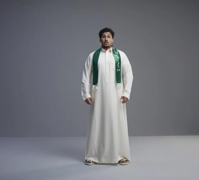 Saudi Man in National Scarf with Surprised Expression