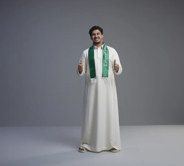 Saudi Man in National Scarf Giving Thumbs Up