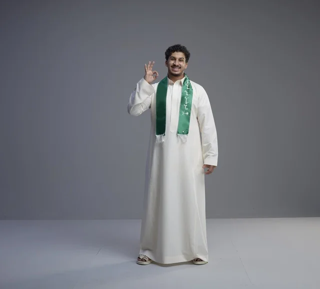 Saudi Man in National Scarf Making Okay Gesture