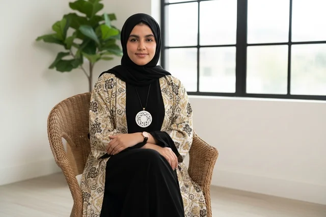 Arab Woman in Black Hijab and Embroidered Abaya