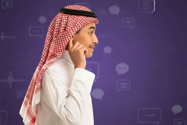 Saudi Man in Traditional Dress with Digital Icons