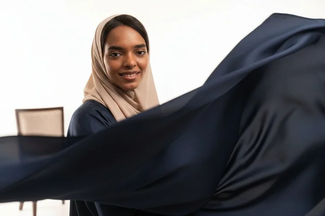 Saudi Woman in Navy Abaya and Hijab Studio Portrait