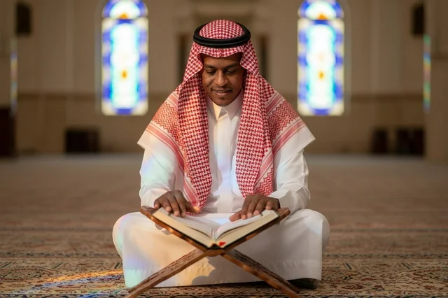 Saudi Man Reading Holy Quran in Mosque Interior
