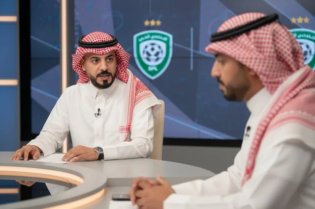 Saudi Men in Television Studio Sports Discussion