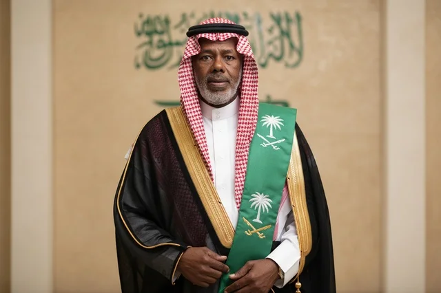 Elderly Saudi Man in Traditional Bisht and National Sash