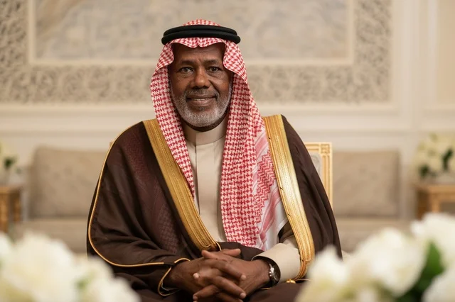 Senior Saudi Man in Traditional Brown Bisht and Shemagh