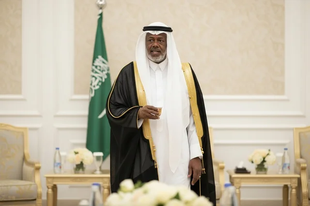 Saudi Man in Traditional Bisht with National Flag