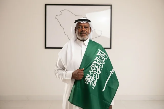 Senior Saudi Man Holding Saudi Arabia Flag Senior Saudi Man Holding Saudi Arabia Flag