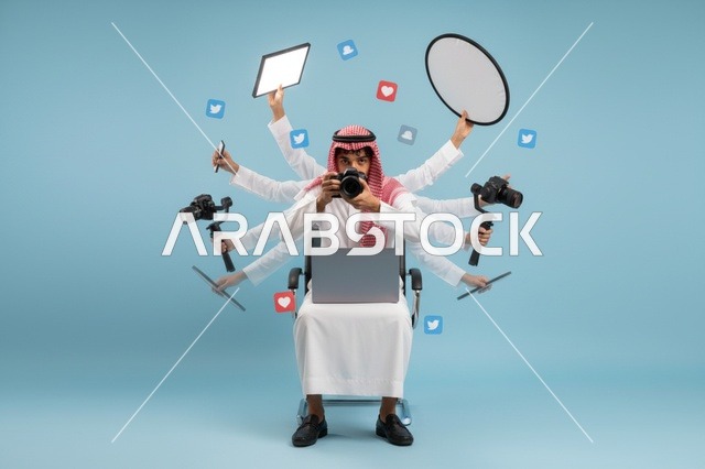 Saudi Man Multitasking with Digital Media Equipment