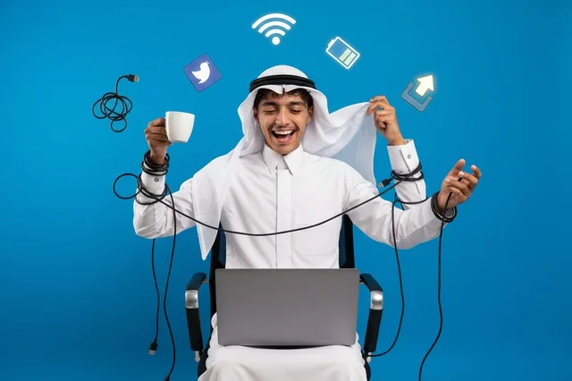 Saudi Man with Laptop and Digital Tech Icons