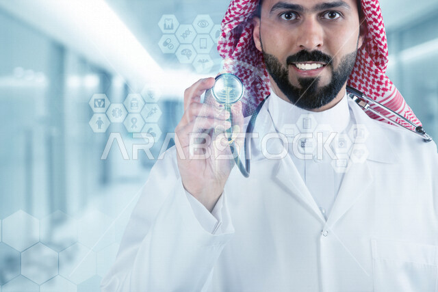 A smiling Saudi Gulf Arab doctor holding a stethoscope combined with hexagonal medical icons with 3D hologram technology, the concept of modern electronic technologies, medical professions and jobs, the concept of medicine and health care