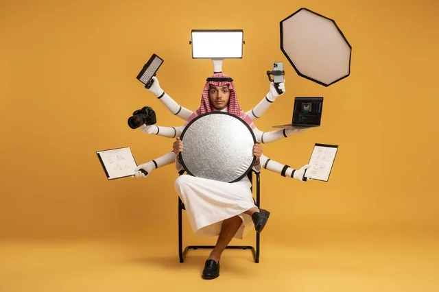 Saudi Man With Robotic Arms And Photography Gear
