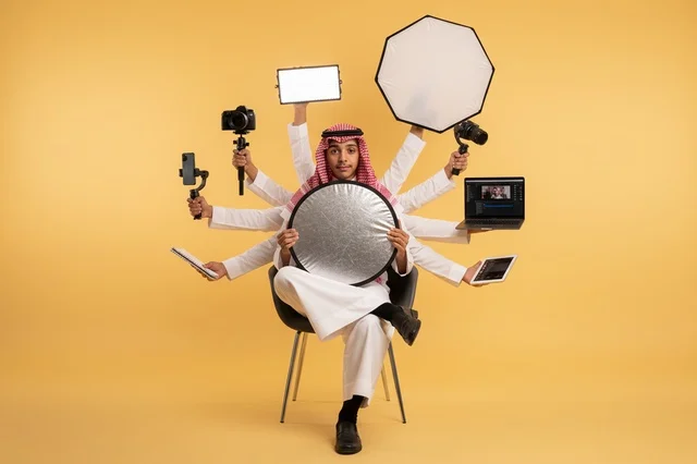 Saudi Content Creator Multitasking with Multimedia Tools