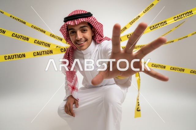 Saudi Man with Caution Tape in White Studio
