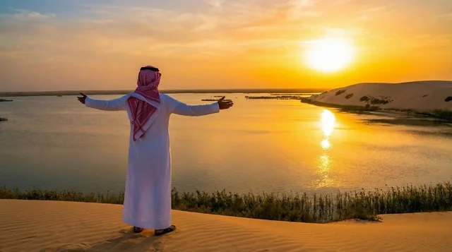 Saudi Man at Desert Lake during Sunset
