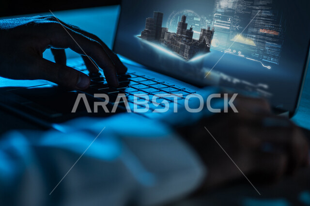 صورة مقربة لرجل عربي خليجي سعودي يستخدم الحاسوب في التصاميم الهندسية المعمارية بتقنية الهولوجرام ثلاثية الأبعاد ، المستقبل العمراني الحديث ، التطور الهندسي المعماري ، شركات هندسية سعودية
